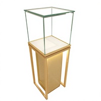 Comptoir de présentation de bijoux haut de gamme en métal doré pour magasin de bijoux sur mesure, design de mobilier de kiosque mural pour bijoux