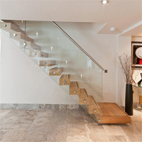 Escalier flottant moderne de luxe PRIMA avec poutre en acier au carbone pour maison et appartement