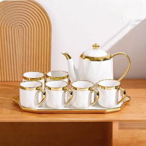 Service à thé en porcelaine de luxe 8 pièces avec plateau, pot à thé et tasses à café en céramique à bord doré - Product Image 1