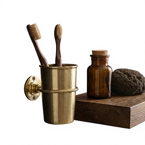 Support mural en laiton avec crochet et porte-brosse à dents en verre de luxe pour accessoires de salle de bain, décoration moderne, durable et écologique - Product Image 1