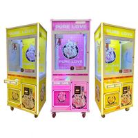 Machine de jeu d'arcade à monnayeur avec grue à griffes pour attraper les poupées