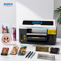 Impresora de inyección de tinta UV pequeña multifunción colores botella de impresión rápida plástico Phonecase encendedor insignia máquina de impresión de Metal con barniz