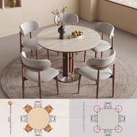 Table à manger ronde en bois massif avec plateau en pierre, style moderne et minimaliste, recommandée par les designers Bauhaus, idéale pour les petits appartements et salons.
