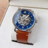 Montre automatique mécanique à remontage manuel pour homme, squelette marron avec index lumineux