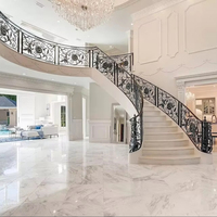 Escalier en colimaçon économique moderne de Foshan, forme incurvée double hélice, en acier galvanisé, avec garde-corps en verre, pour villa intérieure