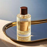Vente en gros de bouteilles de parfum vides en verre avec logo personnalisé et bouchon en bois de 10ml 30ml 100ml pour emballage de marque de Cologne