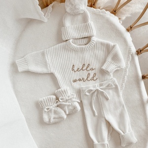 Set di maglioni Unisex in cotone 100% personalizzato con fondo in tinta unita - Product Image 1