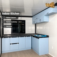 Cabine mobile modulaire préfabriquée de luxe de 40 pieds avec cadre noir et jaune désert, extensible, pour hôtel, boutique ou resort