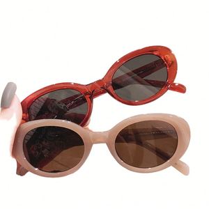 Gafas de Sol Retro 2025 con Logotipo Personalizado, Montura Roja Estilo Ojo de Gato, Protección UV400, Color Jelly, Ovaladas, para Mujer - Product Image 1