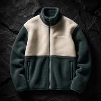 Veste polaire unisexe épaisse avec logo personnalisé, en polyester, col montant, blocs de couleur, fermeture éclair intégrale, poches zippées, pour l'hiver et les activités de plein air