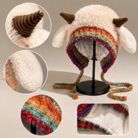 Bonnet d'hiver doux et moelleux en peluche pour femme, style corne, chaud, tricoté, avec protection des oreilles, mignon, à lacets, doublé polaire, coupe-vent