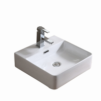Lavabo de salle de bain moderne en céramique blanche polie avec meuble sous-évier et lavabo artistique intégré au comptoir