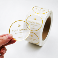 Étiquettes de parfum rondes transparentes personnalisées de luxe, autocollantes en PET, résistantes à l'eau, avec dorure à chaud, en rouleau, pour flacons de parfum
