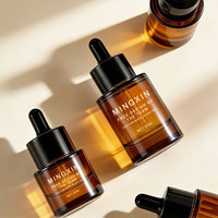 Botella de Vidrio Ámbar Redonda con Gotero y Logotipo Personalizado, 15ml 20ml 30ml 40ml 50ml para Aceite Esencial