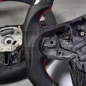 พวงมาลัยรถยนต์ Toyota GR Supra รุ่นใหม่ล่าสุด ผลิตจากคาร์บอนไฟเบอร์และหนังรูพรุน - Product Image 5