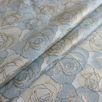 Benang stok benang dicelup kawat emas kain Jacquard dengan tekstur cekung 3D kawat emas perak bunga kain pakaian Jacquard