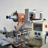 Machine à emballer de bonbons douces à DY-100E flux, de petite taille, résistante et douce, type d'oreiller