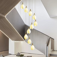 Lustre LED en spirale minimaliste en céramique à motif floral, avec base en métal doré, pour escalier de villa duplex