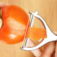 Multifunctionele roestvrijstalen groente- en fruitschiller met siliconen handvat voor gebruik in de keuken