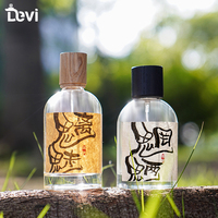 Flacons de parfum orientaux cylindriques transparents personnalisés de luxe en verre vide de 100 ml réutilisables avec bouchon, sérigraphie et pulvérisateur à pompe