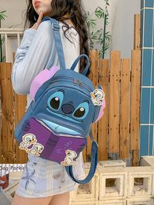 Sac à dos de dessin animé petit monstre en gros transfrontalier pour étudiantes, sac mignon, sac à dos de poupée en peluche bleue de grande capacité - Product Image 3