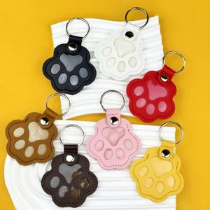Llavero con forma de pata de gato para guardar el pelo de tu mascota, de cuero PU, recuerdo conmemorativo para amantes de perros y gatos - Product Image 1