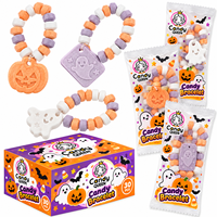 Certificat HACCP/BRC Vente en gros Bonbons durs compressés multicolores aux saveurs fruitées, en forme de fruits de dessin animé, en forme de collier et de bracelet, en vrac, OEM