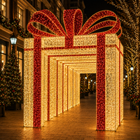 Arche lumineuse tunnel motif boîte cadeau de Noël extérieure grand format, homologuée IP65, très populaire pour la décoration des fêtes