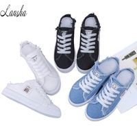 Chaussures en toile à lacets en gros, nouvelles pantoufles plates en jean blanc pour femmes, collection printemps-été 2025