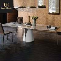Table à manger de luxe italienne avec plateau en marbre, design élégant, meubles de salle à manger en acier inoxydable