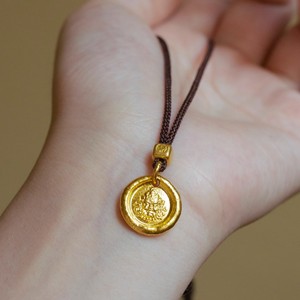 Pendentif Ancien Dieu de la Richesse Jaune Porte-Bonheur sur Cordon de Café, Collier Ajustable Tendance et Polyvalent, Ornement de Style Haut de Gamme - Product Image 1