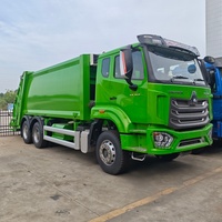 Camion Compacteur de Déchets Électrique d'Occasion Howo 6x4 de Bonne Qualité avec Système Hydraulique 20cbm 21cbm 22cbm Prix