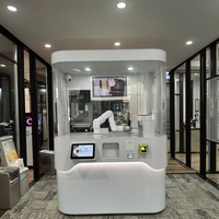 Distributeur automatique de café robotisé fabriqué en Chine avec systèmes de paiement par pièces et code QR, capacité de 150 à 200 unités, construction métallique