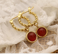 Boucles d'oreilles torsadées en acier inoxydable les plus vendues avec pendentif rond pour femmes