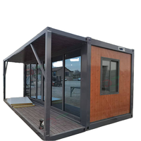 Maison conteneur modulaire de luxe préfabriquée avec structure en acier et mur en verre, personnalisable pour pod de villégiature