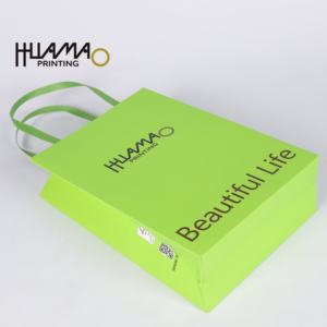 Sacs en papier multicolores Huamao, attrayants et avec poignée, commande en gros pour vêtements, cosmétiques et emballages cadeaux - Product Image 3