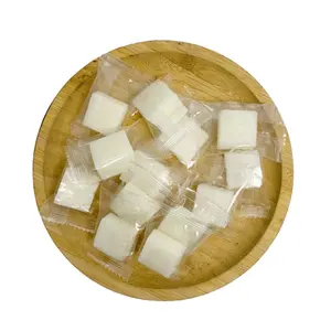 Vente en gros de bonbons à la gelée de fruits à saveur de noix de coco divers goûts fruits cubes bonbons mous collations aux fruits à la noix de coco