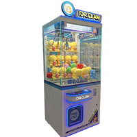 Machine à grue de poupée la plus populaire Mini machine à griffes à pièces d'arcade à 4 roues Console de jeu de prix de divertissement pour enfants