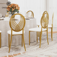 Chaises de mariage élégantes en fer forgé à dossier ailé pour événements romantiques en extérieur, banquets de luxe, design moderne, empilables pour salon - Vente en gros