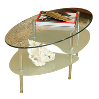 Table basse moderne en verre incurvé avec dessus en miroir rond, échantillon gratuit