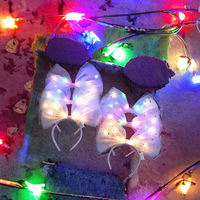 Bandeau de Noël à prix d'usine avec lumières LED colorées Décorations de fête pour femmes et filles Accessoires pour cheveux à grand arc
