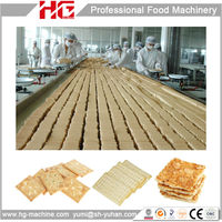 Célèbre marque PLC nouvelle tendance Biscuit ligne Sandwich Biscuit faisant la Machine Biscuit Tin Box Machine machines pour les grandes entreprises