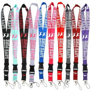 Lanyards de poliéster personalizados de alta calidad de 2.5 cm con sublimación térmica, llavero con pompón y correa, lanyards color rosa en grandes cantidades - Product Image 1