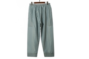 Muslim men's casual pants are comfortable, loose-fitting, solid-colored, with an <b>elastic</b> waistband and a flat front - Product Image 2