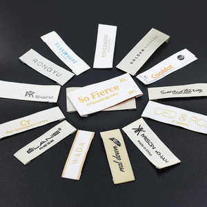 Muestra gratis camisa nombre adhesivo costura tejida etiqueta pegamento rollo marca ropa etiqueta zapatos poliéster ropa etiquetas sostenibles - Product Image 1