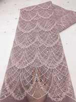 Tissu en dentelle africaine à sequins en gros avec broderie en maille et perles élastiques 100 % polyester pour robes de mariée