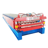 Machine de formage à rouleaux automatique à grande vitesse à double couche pour la production combinée de panneaux de toiture trapézoïdaux ondulés