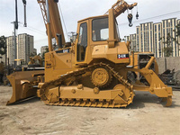 Bulldozer Caterpillar D4H d'occasion très demandé, économique, avec toutes sortes de pièces, y compris le moteur principal et les composants du moteur.