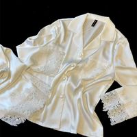 Pyjama en soie glacée haut de gamme pour femme, confortable, nouvelle collection printemps/été, ensemble pantalon et haut à manches longues, avec dentelle élégante, pour la détente