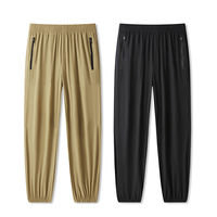 Directo de fábrica para Trail Running con bolsillos dobles con cremallera Pantalones de chándal híbridos